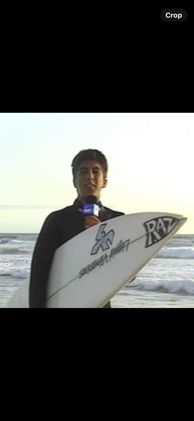 Arturo Serrano with his surfboard